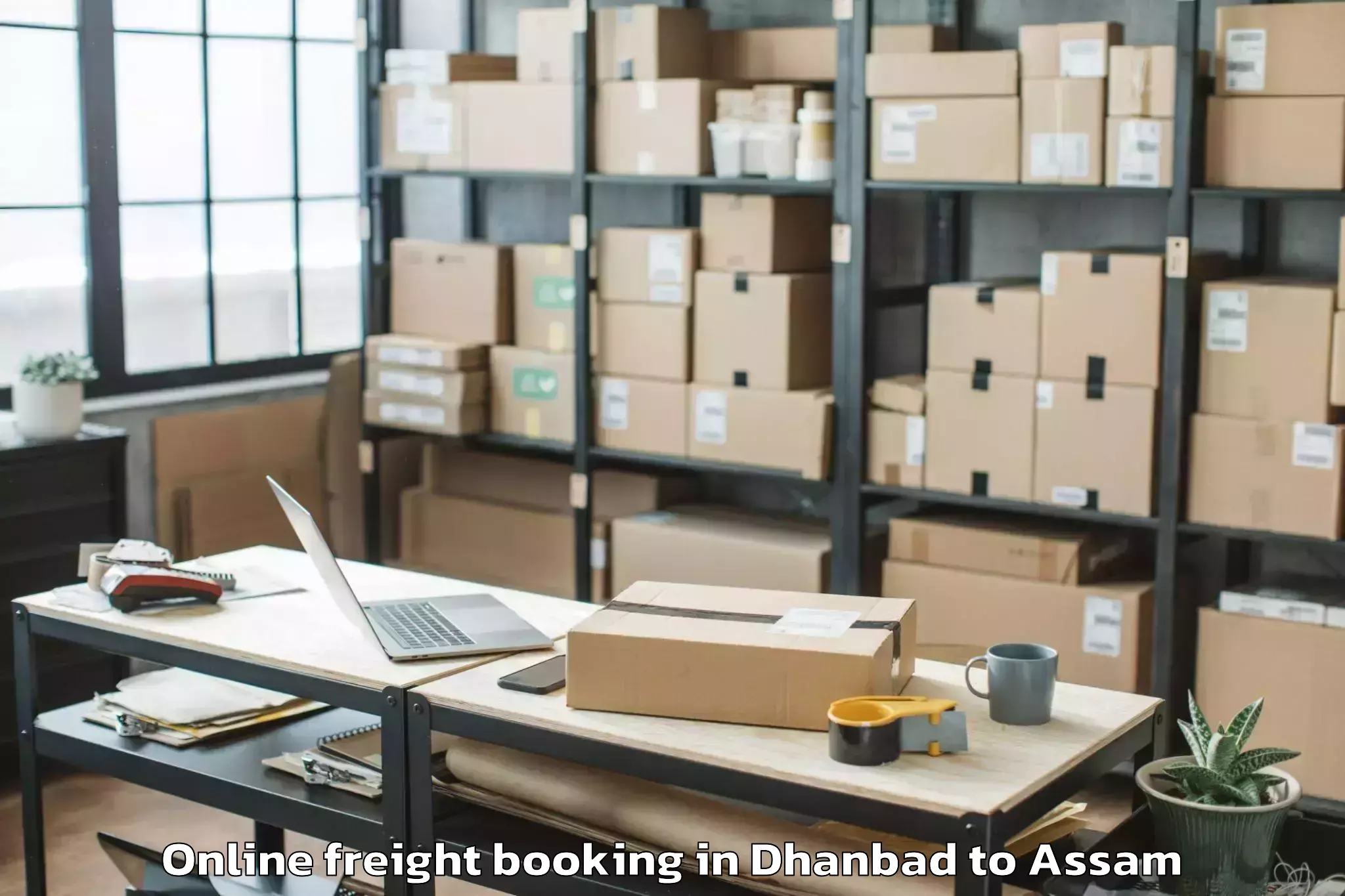 Hassle-Free Dhanbad to Kumbhirgram Airport Ixs Online Freight Booking